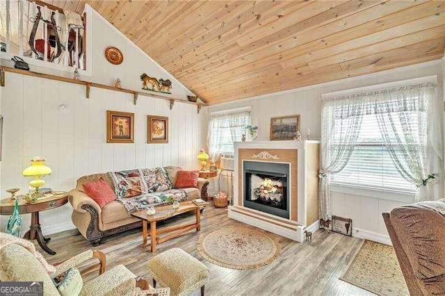 living room with high vaulted ceiling, light hardwood / wood-style flooring, wooden ceiling, and wood walls