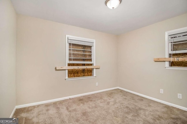 spare room with carpet flooring