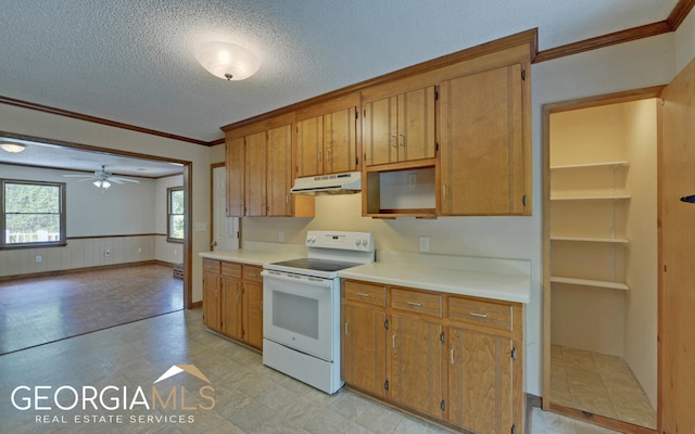 kitchen featuring a textured ceiling, white range with electric stovetop, ceiling fan, and crown molding