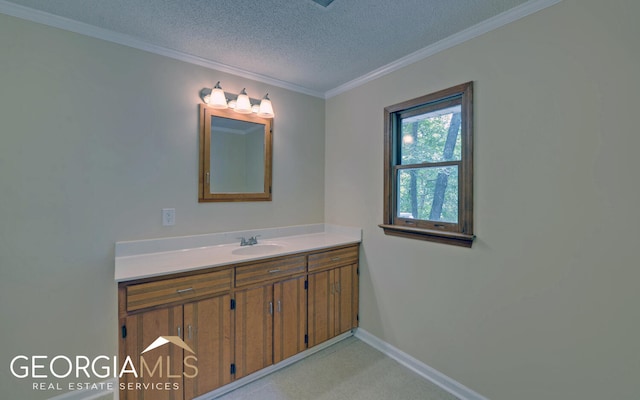 bathroom featuring vanity, a textured ceiling, and crown molding