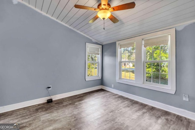 unfurnished room with wooden ceiling, crown molding, vaulted ceiling, hardwood / wood-style flooring, and ceiling fan