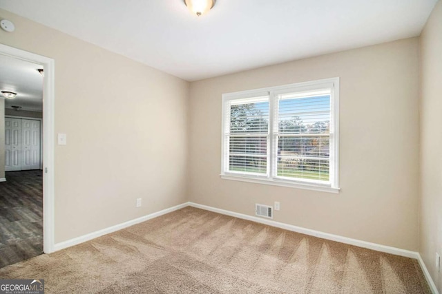 view of carpeted spare room