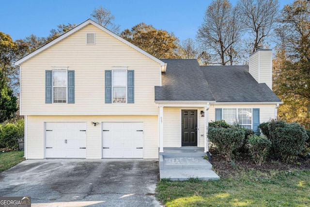 view of front of property with a garage