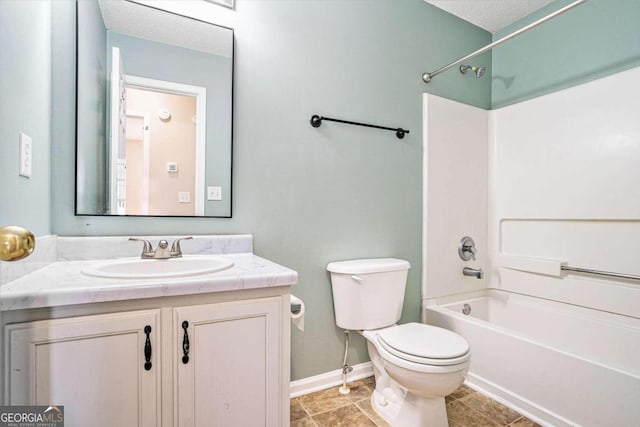 full bathroom with vanity, shower / tub combination, tile patterned floors, toilet, and a textured ceiling