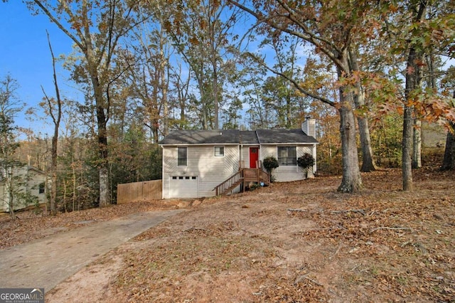 view of front of property featuring a garage