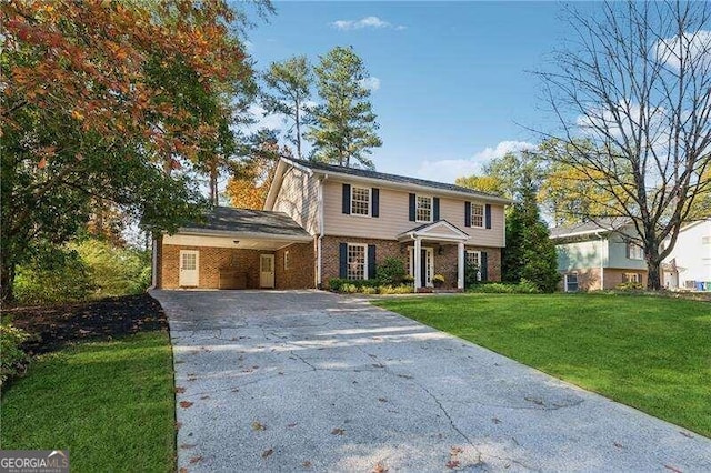 view of front of house featuring a front lawn and a carport