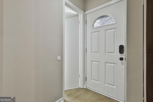 entryway with light hardwood / wood-style floors