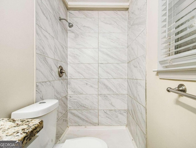3811 Paul St, Douglasville, GA 30135 - bathroom featuring toilet and a shower stall