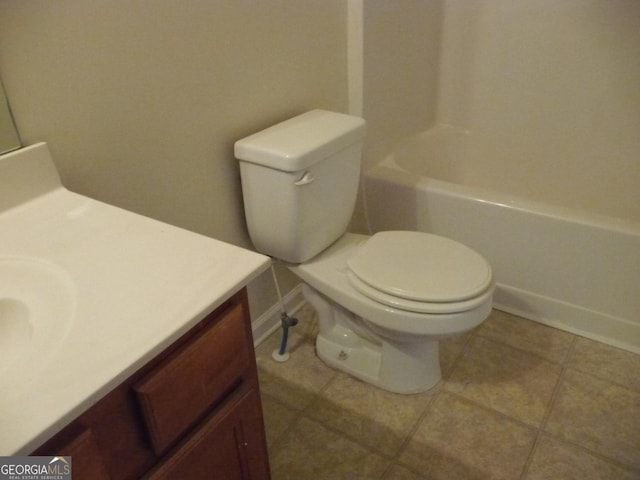 bathroom with toilet and vanity