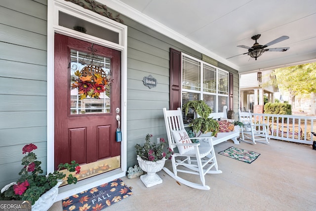 entrance to property with ceiling fan