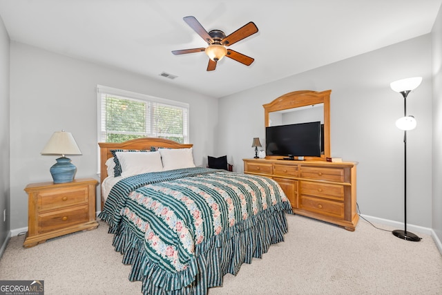 carpeted bedroom with ceiling fan