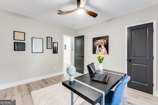 office area featuring light wood-type flooring and ceiling fan