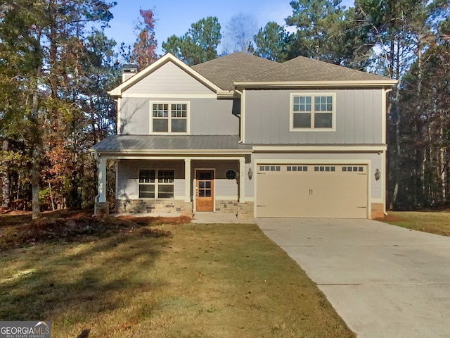 craftsman house featuring a porch, a garage, and a front lawn