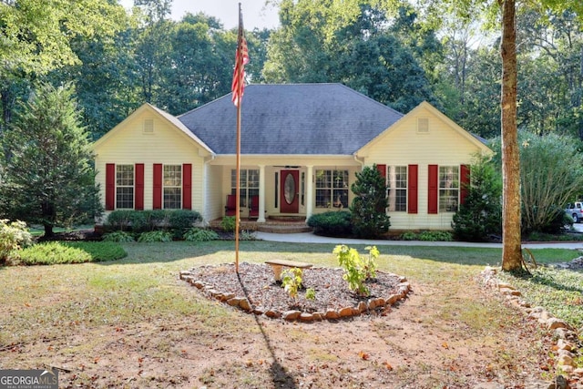 ranch-style house with a front lawn