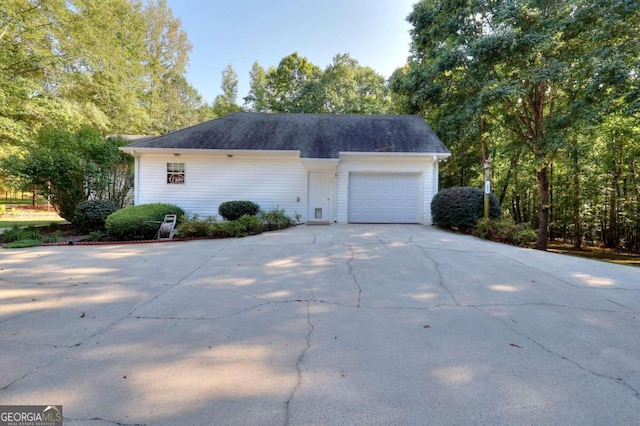 view of side of property featuring a garage