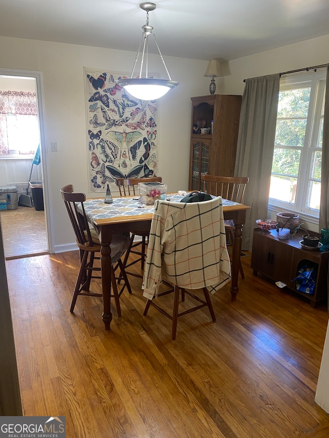 dining area featuring hardwood / wood-style floors