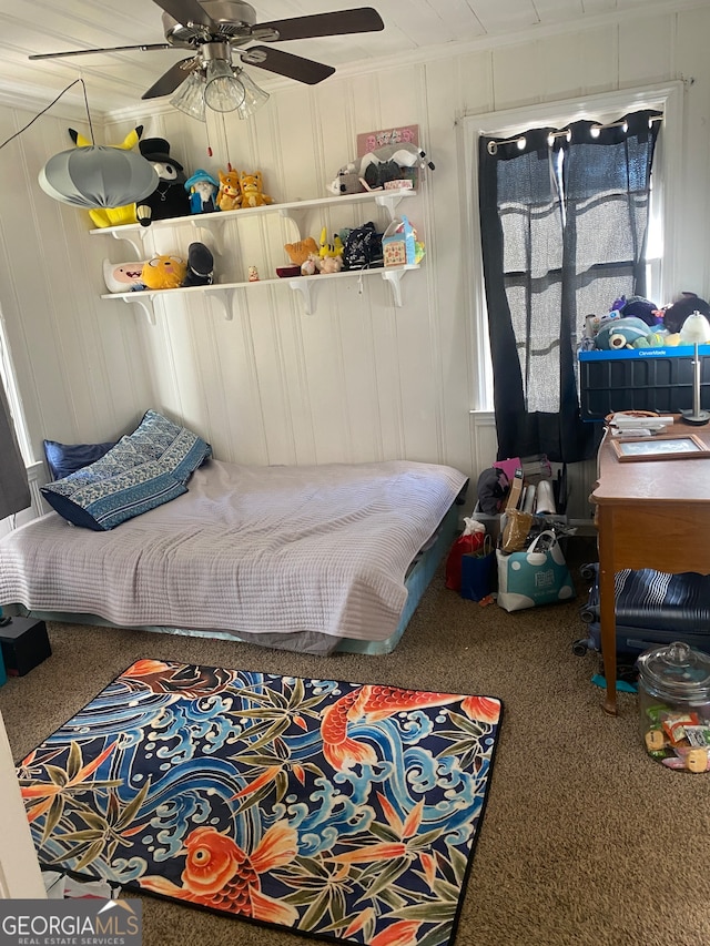 bedroom with ceiling fan and carpet floors