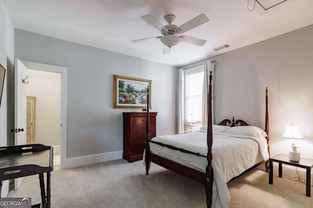 bedroom featuring light carpet and ceiling fan