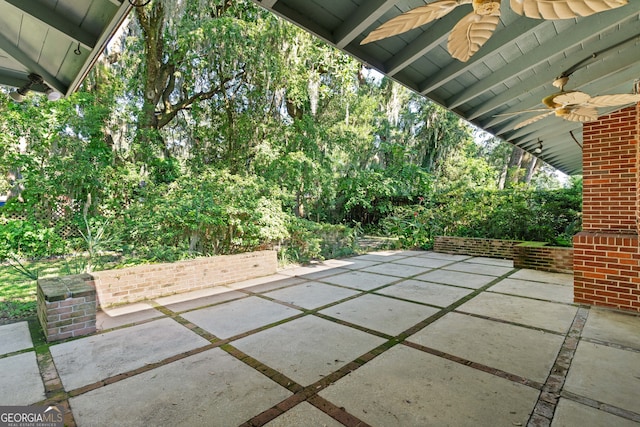 view of patio / terrace featuring ceiling fan