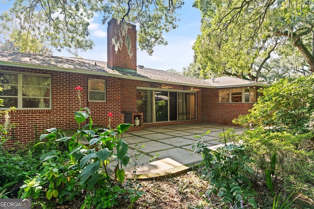 rear view of house featuring a patio area