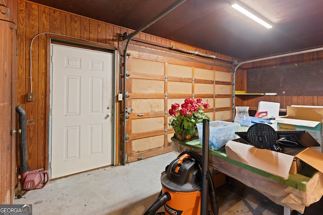 garage with wood walls