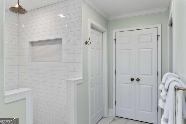 bathroom featuring a shower and ornamental molding