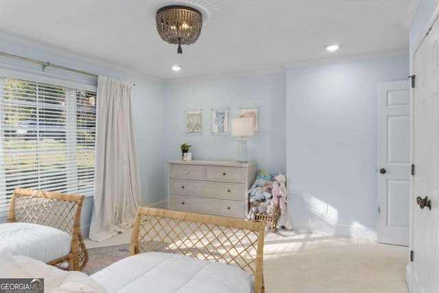 carpeted bedroom featuring crown molding