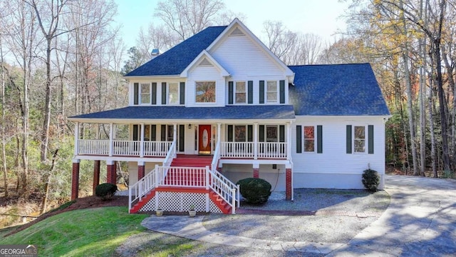 view of front of home with a porch and a front lawn