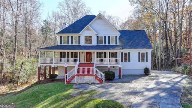 view of front of house featuring a front lawn and a porch