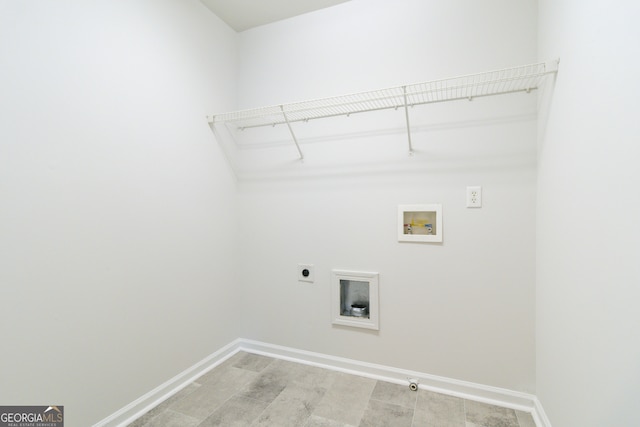 laundry room featuring electric dryer hookup, hookup for a gas dryer, and hookup for a washing machine