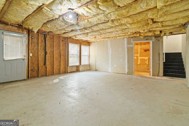 misc room with concrete flooring