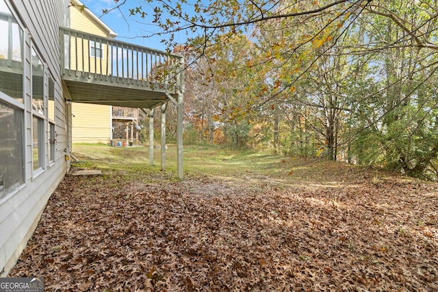 view of yard featuring a deck