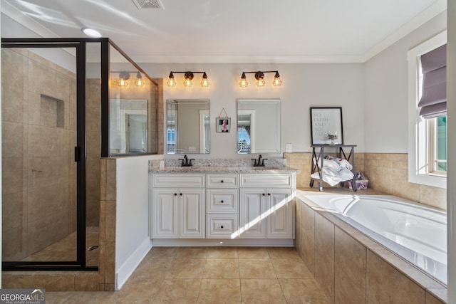 bathroom with plus walk in shower, vanity, tile patterned floors, and ornamental molding