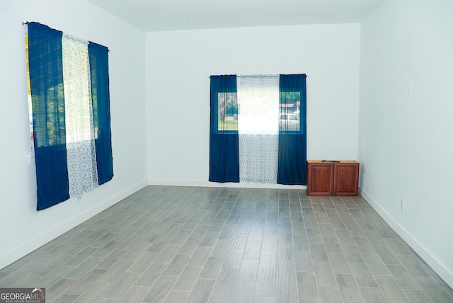 unfurnished room featuring light hardwood / wood-style floors