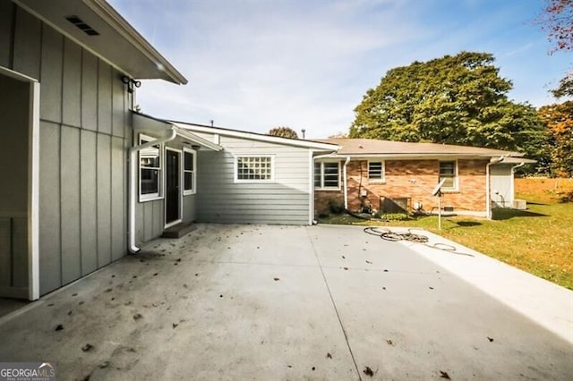 exterior space featuring a yard and a patio