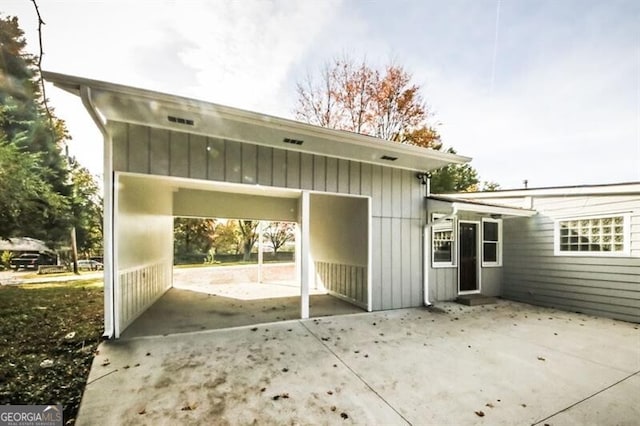 exterior space with a carport