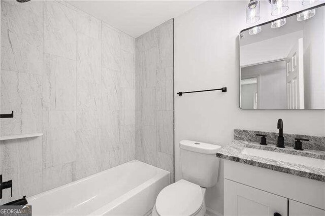 full bathroom with vanity, toilet, and shower / washtub combination