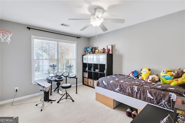 carpeted bedroom featuring ceiling fan