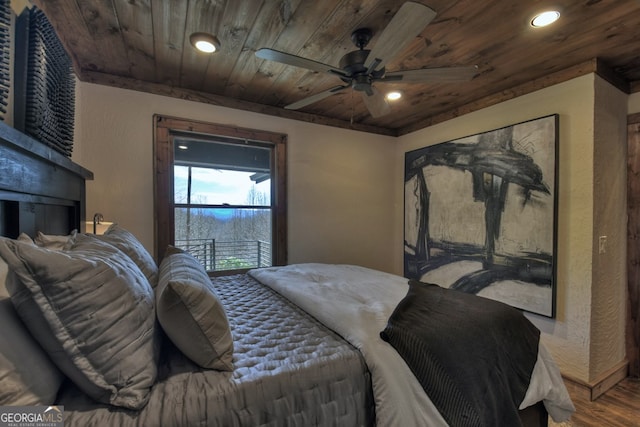 bedroom with wood-type flooring, ceiling fan, and wood ceiling