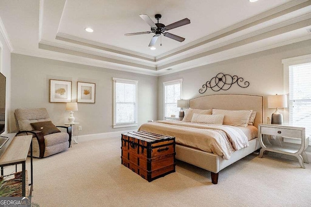 bedroom with light colored carpet, multiple windows, ornamental molding, and ceiling fan