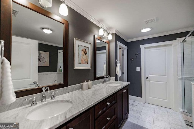 bathroom featuring tile patterned floors, vanity, an enclosed shower, and crown molding