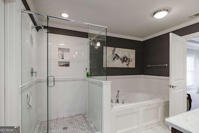 bathroom featuring separate shower and tub and crown molding