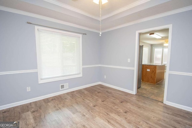 611 Bernhard Rd, Fayetteville, GA 30215 - empty room with ceiling fan, wood finished floors, and crown molding