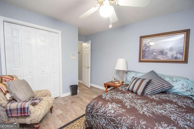 611 Bernhard Rd, Fayetteville, GA 30215 - bedroom with wood finished floors, a closet, and a ceiling fan