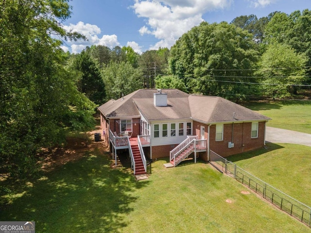 611 Bernhard Rd, Fayetteville, GA 30215 - view of front of home featuring brick siding, stairway, and a chimney