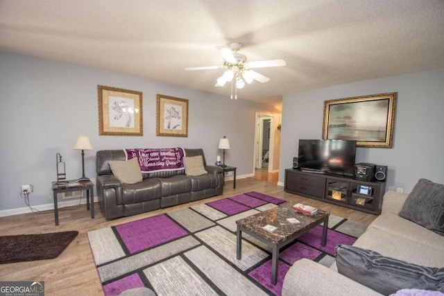 611 Bernhard Rd, Fayetteville, GA 30215 - living area with a ceiling fan, wood finished floors, and a textured ceiling