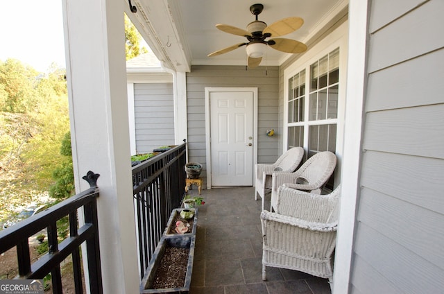 balcony featuring ceiling fan