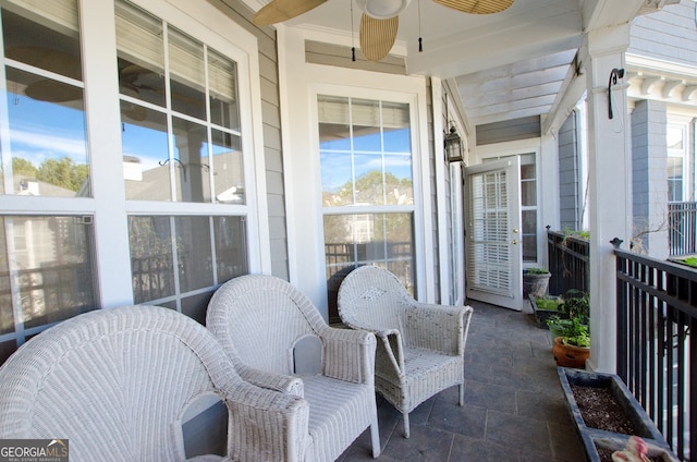 balcony featuring ceiling fan