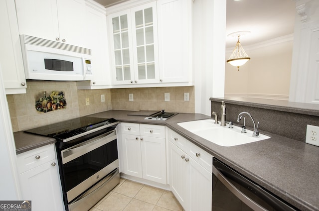 kitchen with white cabinets, sink, and stainless steel appliances