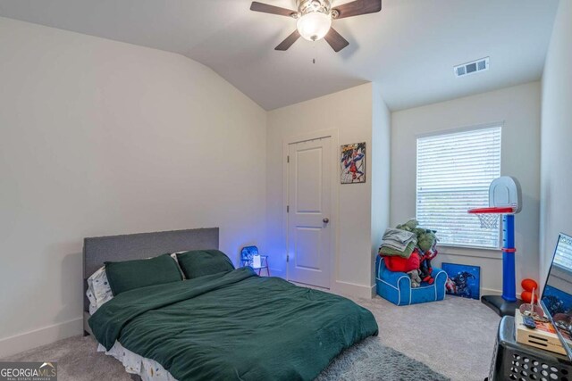 bedroom featuring carpet flooring, ceiling fan, and lofted ceiling